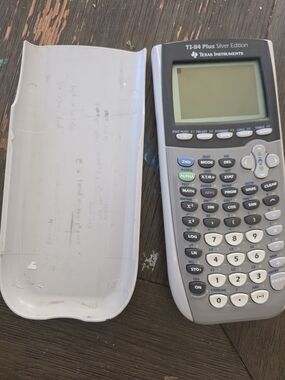 Texas Instruments TI-84 Plus Silver Edition Graphing Calculator - White and Gray